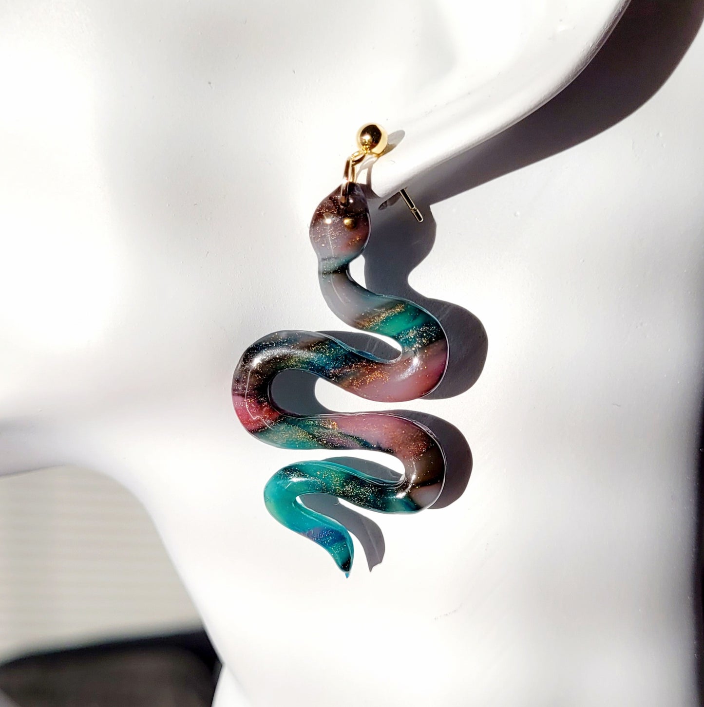 Snake korvakorut